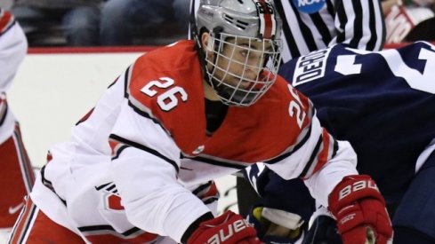 Ohio State forward Mason Jobst skates against Penn State. 