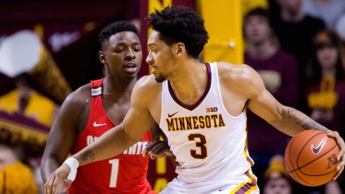 Ohio State's Jae'Sean Tate defends Minnesota's Jordan Murphy.