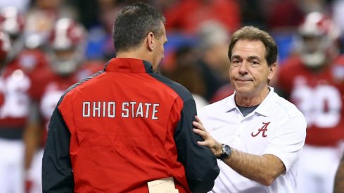 Urban Meyer and Nick Saban