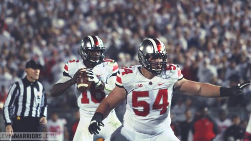 J.T. Barrett drops back to pass in 2014.