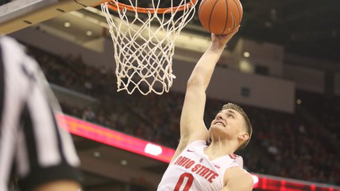 Ohio State's Micah Potter dunks during Sunday's game against Northwestern. 