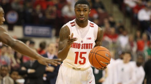 Ohio State redshirt junior guard Kam Williams holds the ball against Northwestern. 