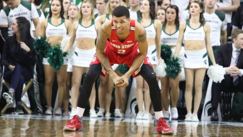 Ohio State's Marc Loving in a defensive stance at Michigan State.