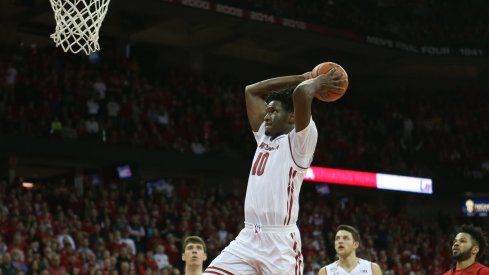 Feb 19, 2017; Madison, WI, USA; Wisconsin Badgers forward Nigel Hayes (10) prepares to dunk the ball at the end of the game with the Maryland Terrapins at the Kohl Center. Hayes later apologized for the dunk during the post-game news conference. Wisconsin defeated Maryland 71-60. Mandatory Credit: Mary Langenfeld-USA TODAY Sports