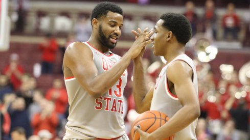 JaQuan Lyle and C.J. Jackson celebrate a win over Wisconsin.