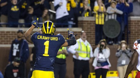 Kekoa Crawford and a talented group of young wideouts will help carry the load in Ann Arbor.