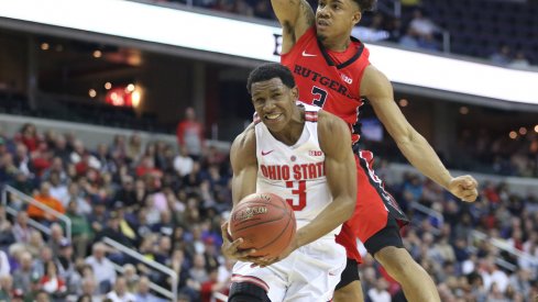 C.J. Jackson grimaces under defensive pressure against Rutgers in the Big Ten Basketball Tournament.