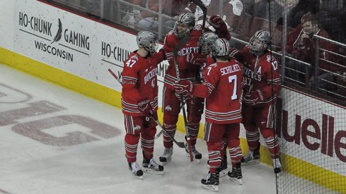 Ohio State men's hockey celebrates a goal against the Wisconsin Badgers.