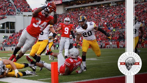 Carlos Hyde dives for the python against Iowa for the March 17th 2018 Skull Session.