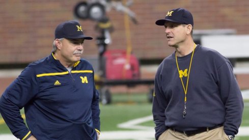 Don Brown and Jim Harbaugh discuss the Wolverine defense.