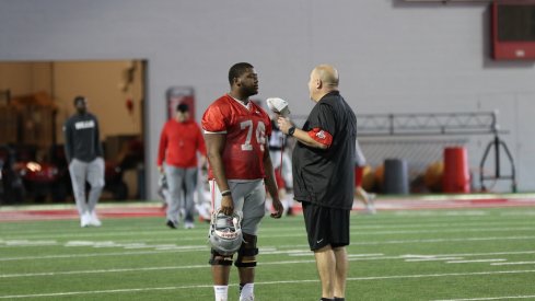 Ohio State's Jamarco Jones talks to Greg Studrawa during the spring.