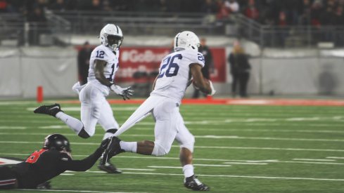 Saquon Barkley runs against Ohio State in 2015.