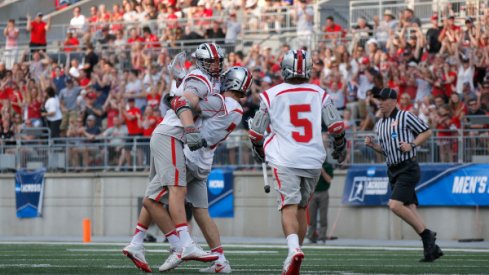 Ohio State men's lacrosse after a win in Ohio Stadium against Loyola Maryland.