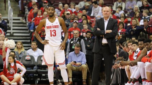 JaQuan Lyle and Thad Matta stand in front of Ohio State's bench last season.