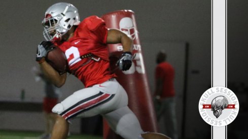 J.K. Dobbins breaks a tackle for the July 20 2017 Skull Session