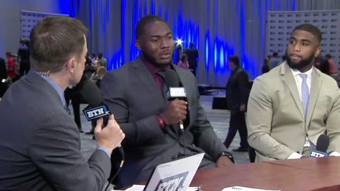 Tyquan Lewis and Chris Worley speaking to BTN's Dave Revsine at Big Ten Football Media Days in Chicago