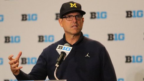 Michigan head coach Jim Harbaugh speaks at Big Ten Media Days.