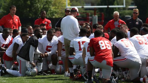 Urban Meyer addresses his team during fall camp last season. 