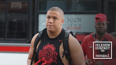 Ohio State football players check into fall camp.