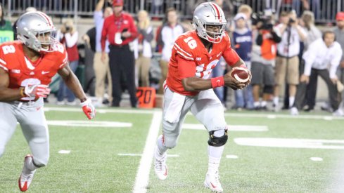 J.T. Barrett ran more than Ohio State's running backs on Saturday night.