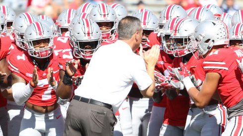 Urban Meyer getting the troops ready.