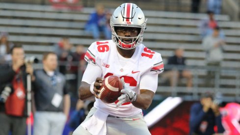 J.T. Barrett warms up against Rutgers