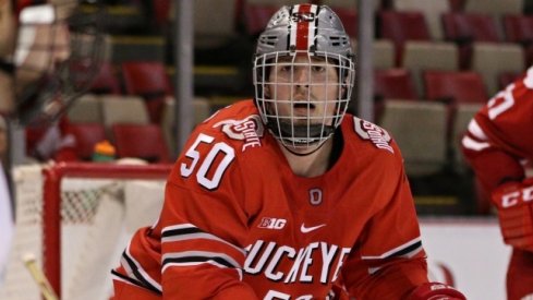 Ohio State's Matt Miller keeps an eye on the Badgers