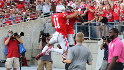 Austin Mack celebrates against Maryland