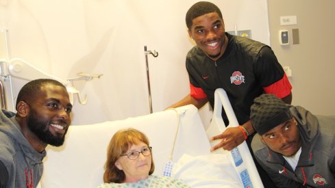 J.T. Barrett, Jeffrey Okudah and Jaylen Harris visited the James Cancer Hospital on Monday.