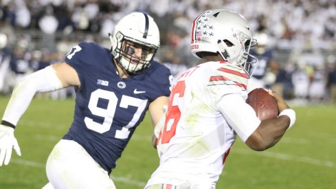 JT Barrett chased by Penn State defender