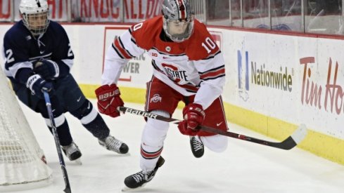 Buckeye forward John Wiitala chases the puck in a game against Penn State at Value City Arena.