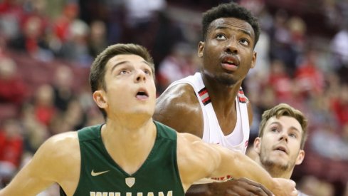 Ohio State basketball player Andre Wesson fights for a rebound