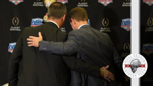 Bill Swinney and Urban Meyer hug for the December 21st 2017 Skull Session