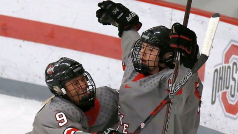 Buckeye freshman Liz Schepers celebrates a goal against Minnesota with Liv Halvorson.