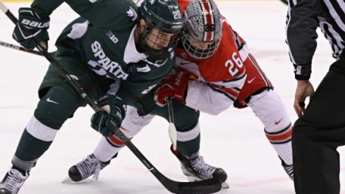 Buckeye captain Mason Jobst and Ohio State men's hockey square off against the Michigan State Spartans.