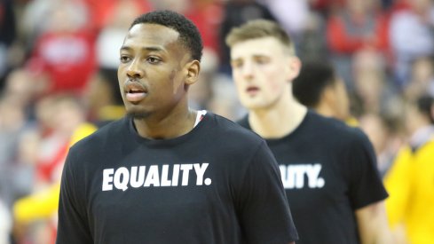 Andre Wesson and Micah Potter wearing "Equality" shirts to recognize Black History Month before Saturday's game against Iowa.