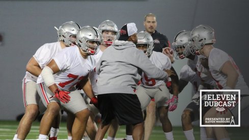 Ohio State assistant coach Taver Johnson and players