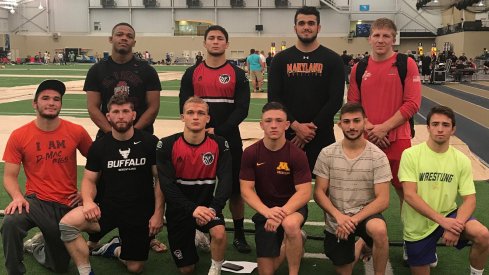 Myles Martin (back left) and Kollin Moore (back right) anchor the U23 Freestyle World Team.