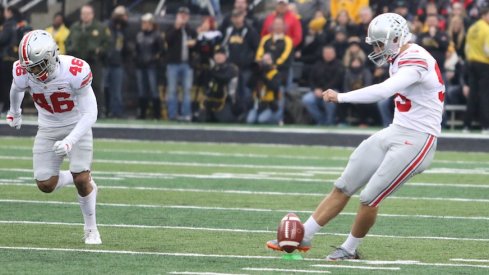 Blake Haubeil kicking off during Ohio State's 2017 game at Iowa.