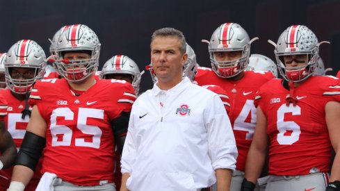 Urban Meyer and two players he redshirted.