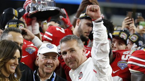 Urban Meyer celebrates his team's Cotton Bowl win over USC.