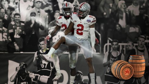 December 31, 2016; Glendale, AZ, USA; Ohio State Buckeyes safety Malik Hooker (24) celebrates with cornerback Marshon Lattimore (2) after intercepting pass against the Clemson Tigers during the first half of the the 2016 CFP semifinal at University of Phoenix Stadium. Mandatory Credit: Matthew Emmons-USA TODAY Sports