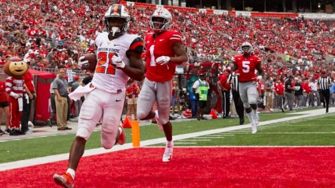 Oregon State Beavers running back Artavis Pierce (21) scores a touchdown against the Ohio State Buckeyes during the second half at Ohio Stadium.