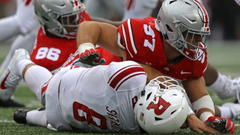 Nick Bosa sacks Artur Sitkowski during the first half of Saturday's game.