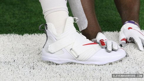 Custom white LeBron Soldier XII cleats for Ohio State football.