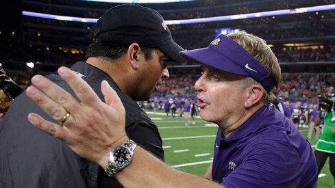 TCU coach Gary Patterson congratulates Ohio State coach Ryan Day following Ohio State's 40-28 win over the Horned Frogs.