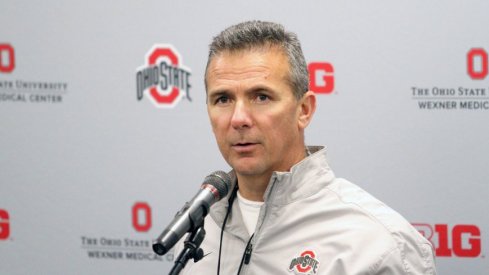 Former Head Breakfast Coach Urban Meyer at the podium.