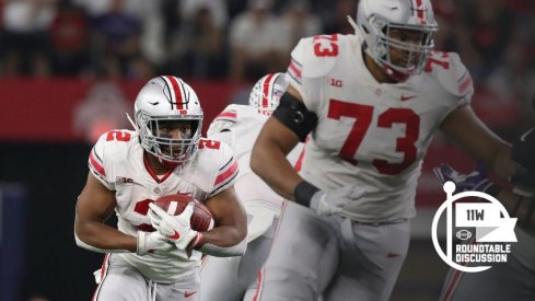 J.K. Dobbins looks for a crease.