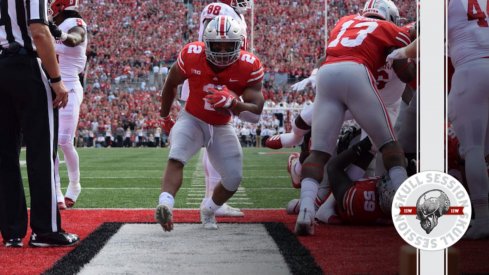 J.K. Dobbins walks into today's skull session.