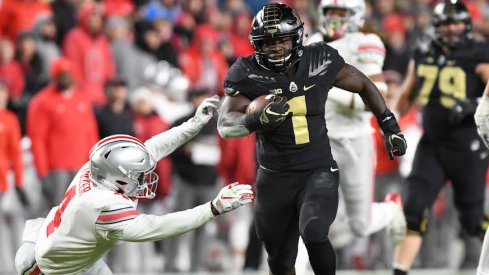 D.J. Knox runs past Ohio State's Jordan Fuller for a touchdown.